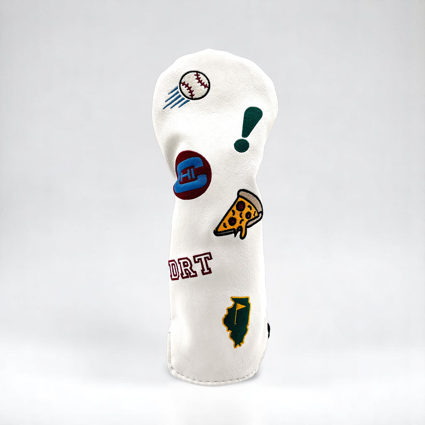 White golf club wood head cover with custom patches on white backdrop