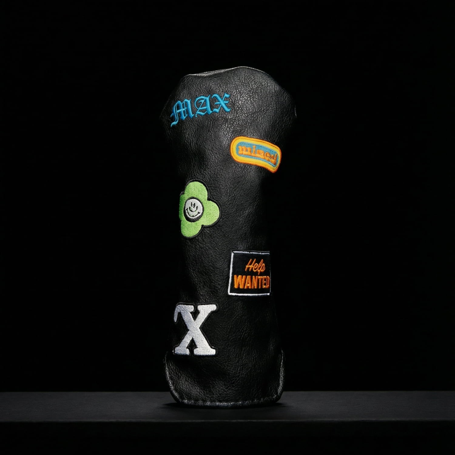 Custom black hybrid golf club cover with MAX monogram, Miami patch, green flower, and Help Wanted patches - premium vegan leather